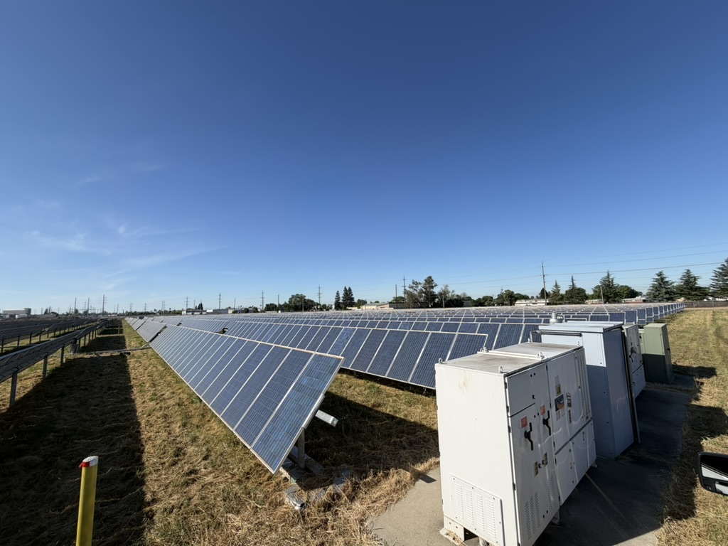 Utility-scale solar array with combiner boxes and inverter equipment under ETS field diagnostics